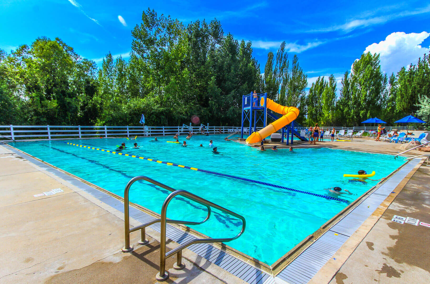 An expansive outdoor swimming pool at VRI's Wolf Creek Village I in Eden, Utah.